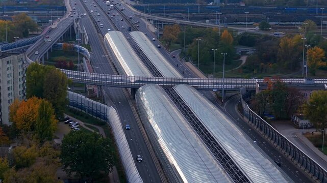 Trasa Torunska highway glass roof tunnel, expressway s8, Warsaw city traffic junction, Drone shot