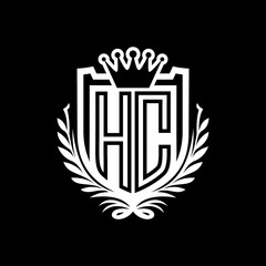 HC Letter logo heraldic shield shape with crown on black background template design