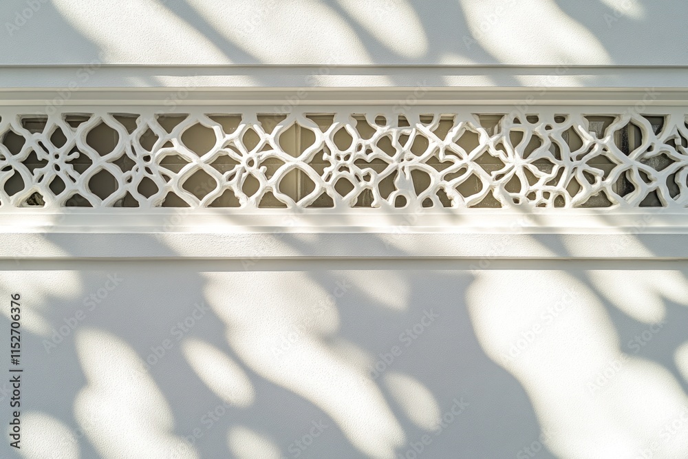 Poster Decorative wall with intricate pattern casting soft shadows.