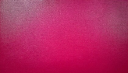 Fototapeta premium A solid, uniformly textured background is presented in a vibrant, bright pink color