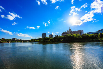 A beautiful blue sky with a river in the background