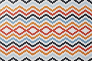 a close up of a colorful pattern of squares and lines