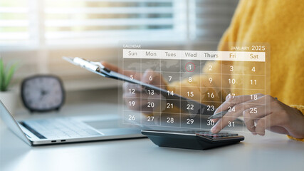 Businesswoman using calculator, doing calculations, Business Planning Calendar Agenda work schedule concept and Plan your annual tax filing, Organize schedules and important dates. plan, goal.