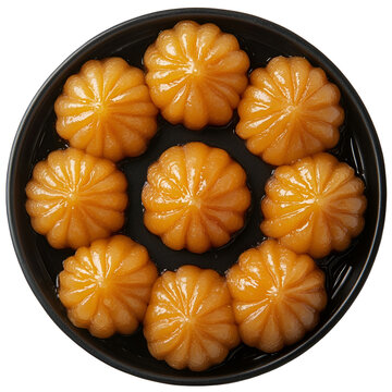 Top view of an extremely perfect looking Badusha in a dark tray isolated on a white transparent background