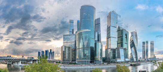 High buildings of Moscow-City at Moskva River at summer sunset, Russia.