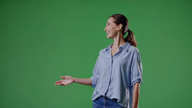 Woman in Light Blue Blouse, Mid-Motion Against Green Screen, For Superimposition