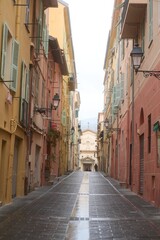 Naklejka premium Colorful streets of Menton, France revealing charming architecture and a quiet afternoon atmosphere