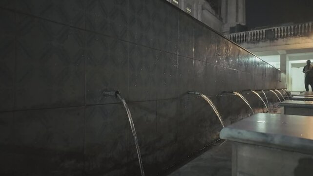 View of opened water taps in the ablution area in Ilyasi Masjid in Abbottabad, Pakistan