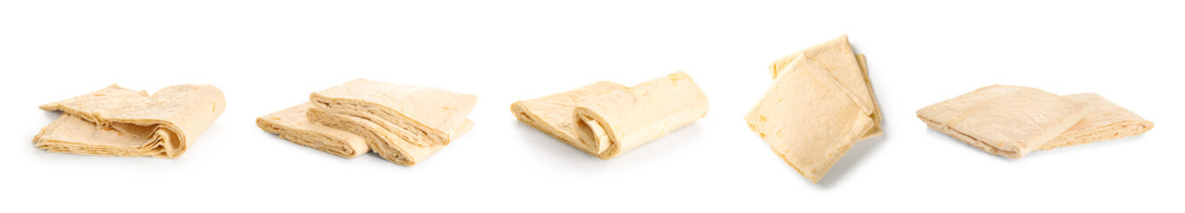 Set of fresh thin lavash on white background