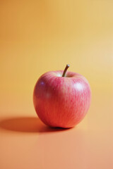 Red Apple in Vibrant Colors Representing Health and Freshness Against Warm Background