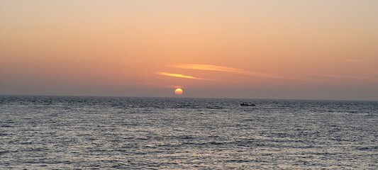 Obraz premium sunset, scenery landscape, soft color sunset on ocean coast