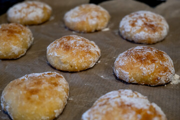 Homemade cookies on baking paper. Fresh homemade cookies. Culinary background.
