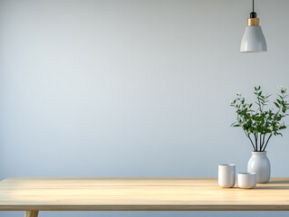 Minimalist dining area with a simple table and elegant floral arrangement
