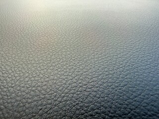 凸凹した質感のグレーのカーフ素材