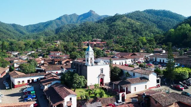 Magical town with traditional tile houses. Located 1:30 hours from Puerto Vallarta, Jalisco. La Bufa hill in the background