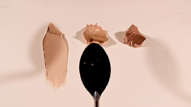 Cosmetic Smears of Creamy Texture, Concealer, Liquid Foundation, Gel Fluid, Makeup Brush, Spatula. Beauty Skincare Product Sample. Advertising. Organic Cosmetics, Medicine. Macro shoot. 4k