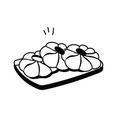 Tray of freshly baked cookies with chocolate chips