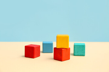 Obraz premium Colorful building cubes on color background