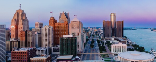 Detroit skyline at dawn, showcasing iconic skyscrapers and the Detroit River. Urban landscape. DOWNTOWN, DETROIT, MICHIGAN, UNITED STATES © Zenstratus