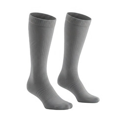 Fashionable grey knee-high socks for men and women home setting apparel photography cozy environment close-up view comfort and style