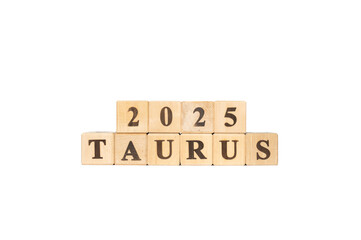 Taurus zodiac sign word in wooden cubes. White background. Set of astrology symbols. Horoscope 2025...