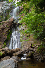 Fototapeta premium Khlong Lan Waterfall is one of the most beautiful and grand waterfalls in Thailand. The area above the cliff of the waterfall is a wide plain. Below the waterfall is a large pool where you can swim. 