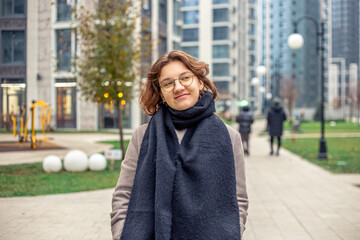 Portrait of a young woman in a big city. Woman in the city.