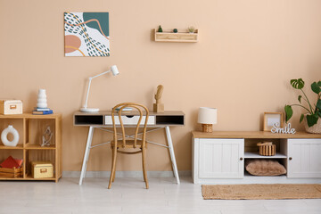 Workplace, sideboard and picture on wall in living room