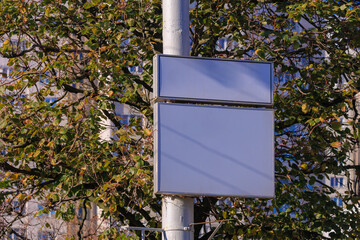 Background for design, white billboards on city streets and along roads