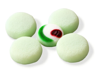 Obraz premium Mochi Soft and chewy rice cake balls filled with sweet red bean paste, arranged in a dynamic pattern with colorful