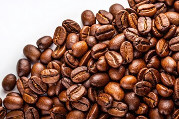 Obraz premium Fresh Roasted Coffee Beans Isolated on White Background - High-Resolution Stock Photo