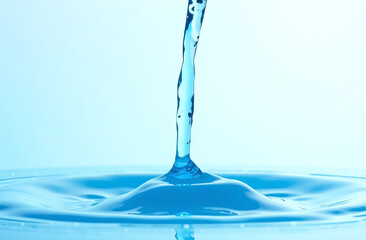 Pouring water, blue liquid splash, design element.