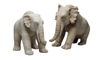 Two Elephant Figurines Isolated on a Transparent Background (PNG).