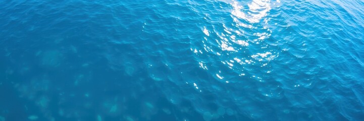 Tranquil Blue Ocean Water Surface with Sunlight Reflections Creating a Serene and Peaceful Seascape Ideal for Nature and Travel Themes