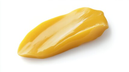 Close-up of a vibrant yellow food substance, showcasing its smooth texture and delicious appearance.