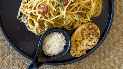 delicious spaghetti carbonara with cream and parmesan cheese