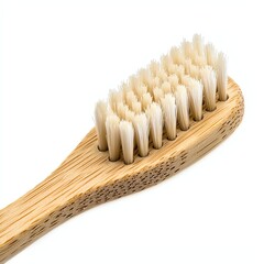 A natural bamboo toothbrush with soft bristles, promoting eco-friendly oral hygiene and sustainability.