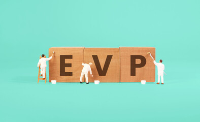 Miniature people painting some wooden cube with EVP (Employee Value Proposition) words