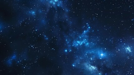 Fototapeta premium A dark, blue night sky with stars and constellations.