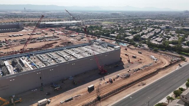 Drone shot over cituscape and the QTS Data Center under construction in downtown Phoenix in Arizona
