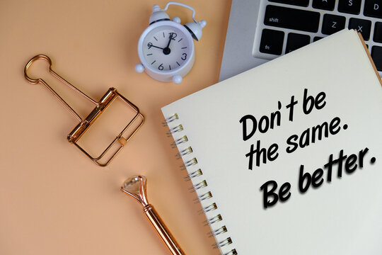Motivational quote Do not be the same, be better. Note to self concept with text on a notebook with pen and a clock. Self confidence motivation and reminder. Believe in yourself. 