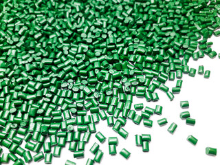 Pearl green masterbatch granules on white background.Color pigment carrier polymer in plastic industry.Suitable for plastic company catalog design