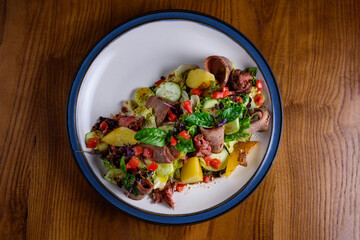 salad with roast beef, cucumber and sesame sauce