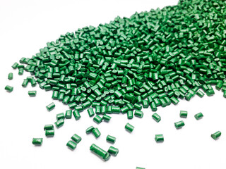 Pearl green masterbatch granules on white background.Color pigment carrier polymer in plastic industry.Suitable for plastic company catalog design