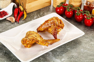 Tasty roasted chicken wing with spices