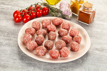 Uncooked raw beef meatball minced