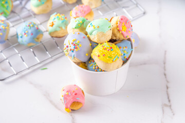 Fototapeta premium Sweet colorful glazed donuts holes dessert