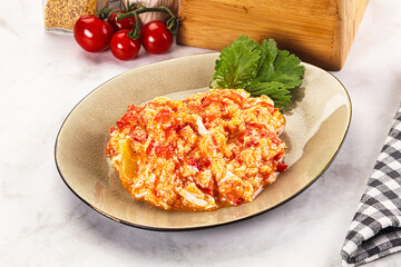 Shakshuka with tomato for breakfast