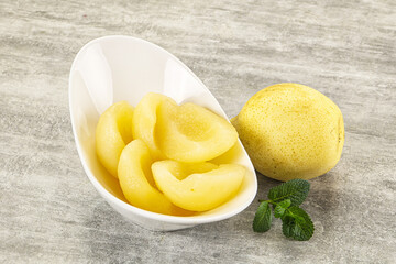 Canned yellow pear with syrup
