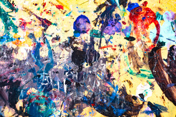 A painting of a messy room with splatters of paint everywhere. The colors are bright and chaotic, giving the impression of a creative and energetic space